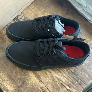 Black non-slip work shoes, brand new with tags.